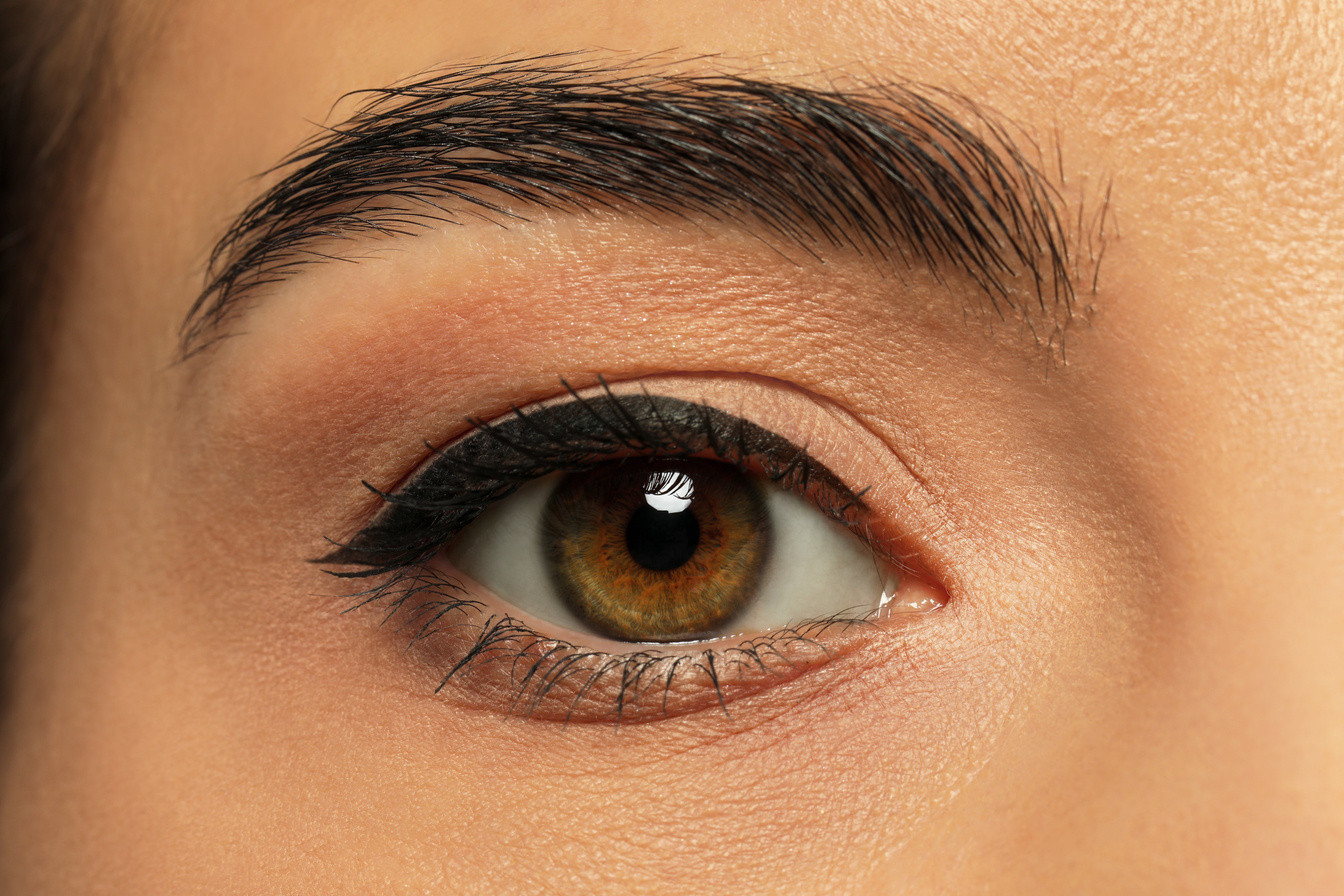 Young Woman with Permanent Eyeliner Makeup, Closeup